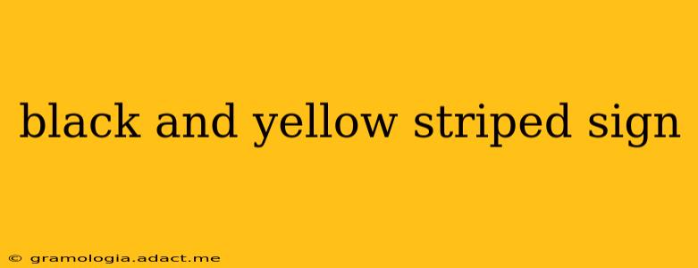 black and yellow striped sign